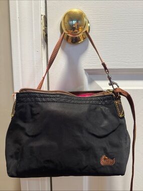Dooney & Bourke Black Wristlet with Brown Trim